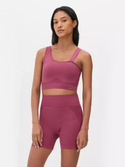 Primark Odzież Domowa I Na Siłownię|Topy I T-Shirty<Krótki asymetryczny top Kappa x