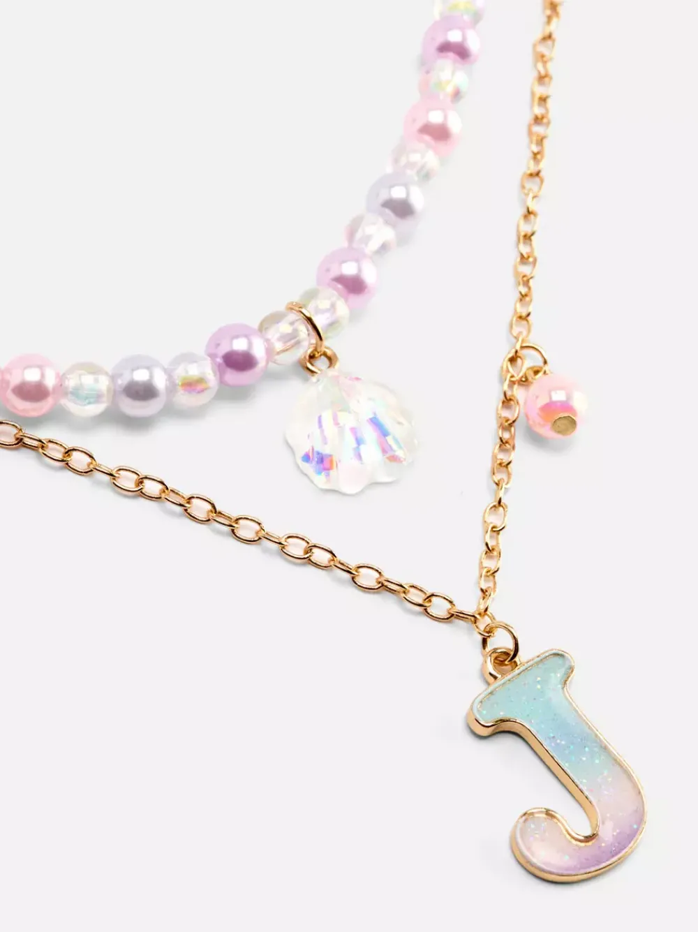 Dzieci Primark Biżuteria<Naszyjniki z inicjałem i muszelką, 2 szt.