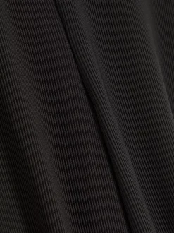 Dzieci Primark Spodnie I Legginsy<Prążkowane spodnie z rozszerzaną nogawką