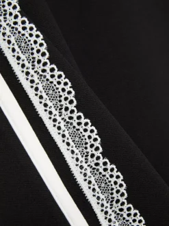 Dzieci Primark Spodnie I Legginsy<Spodnie z bocznym paskiem i koronką